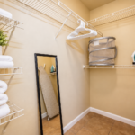 Organized Walk-In Closet with Warm Neutrals