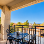 Sunlit Balcony Overlooking Mountain Neighborhood