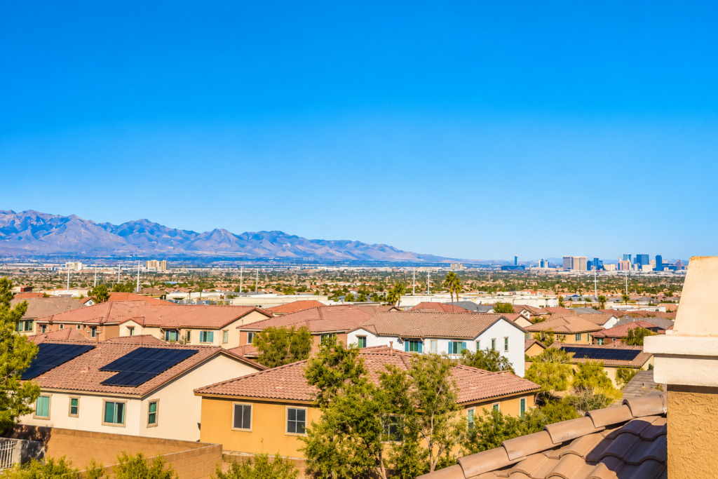 Sunlit Suburban Valley and Mountain Skyline