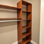 Empty Warm Wood Walk-In Closet