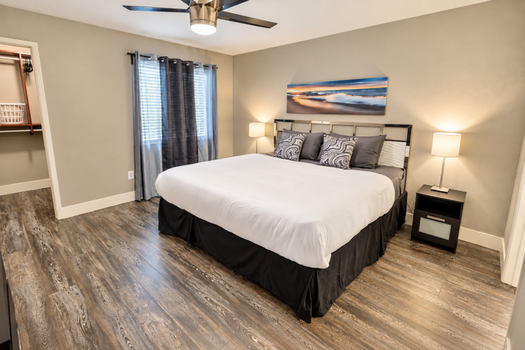 Modern Bedroom with Seascape Artwork