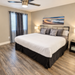Modern Bedroom with Seascape Artwork