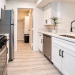 Bright Modern Galley Kitchen with Pantry