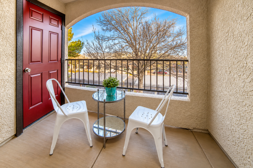 Cozy Stucco Balcony with Arched View