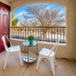 Cozy Stucco Balcony with Arched View