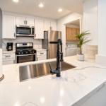Modern White Kitchen with Marble Quartz Counters